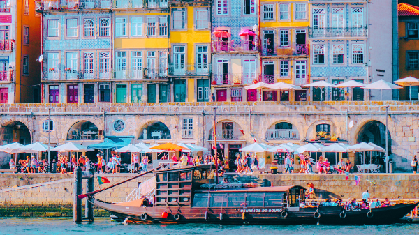 A boat and buildings in Lisbon